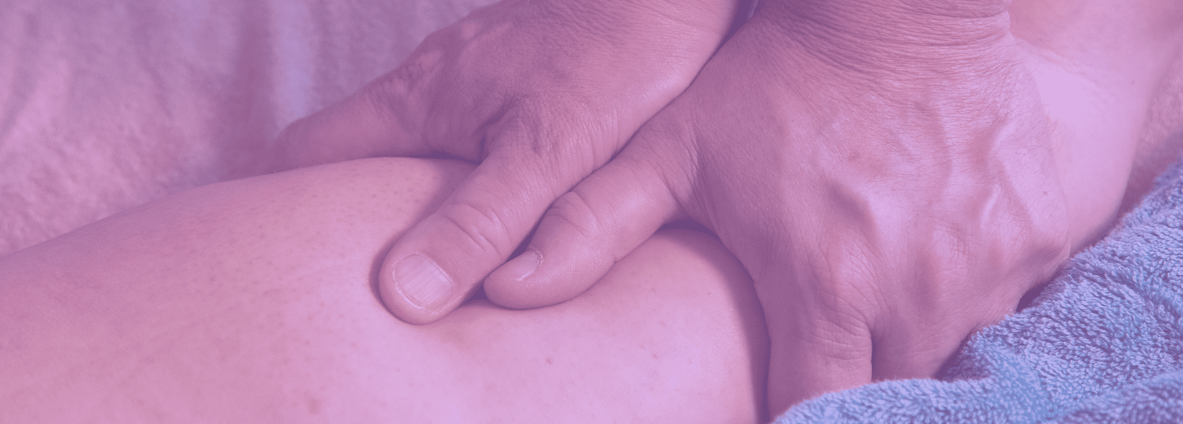 photo showing hands performing a therapeutical massage